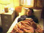 Sean lying in bed with little to do.